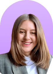 Headshot of a smiling woman against a purple background