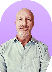 Headshot of a man against a purple background