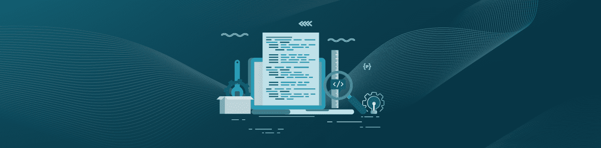 Laptop displaying code, tools, and a ruler; illustrating integration testing techniques.